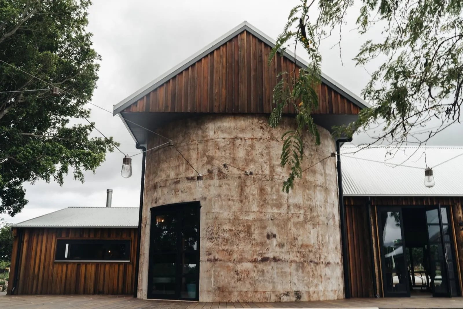 The Gables from outside: a stone silo between timber gables